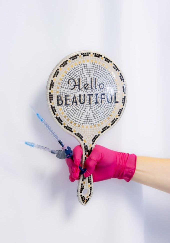 Hello Beautiful hand mirror with treatment supplies